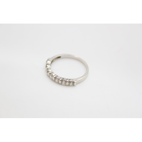 65 - A 9ct white gold gemstone half eternity ring - approx. gross weight 2.2 grams, size R