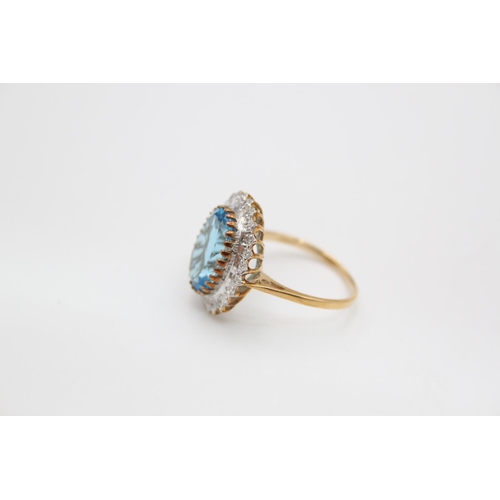 66 - A 9ct gold aquamarine paste halo ring, size Q ½ - approx. gross weight 4.4 grams