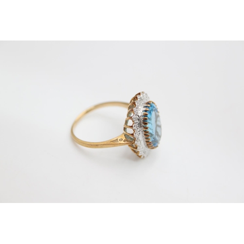 66 - A 9ct gold aquamarine paste halo ring, size Q ½ - approx. gross weight 4.4 grams