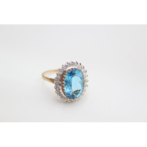 66 - A 9ct gold aquamarine paste halo ring, size Q ½ - approx. gross weight 4.4 grams