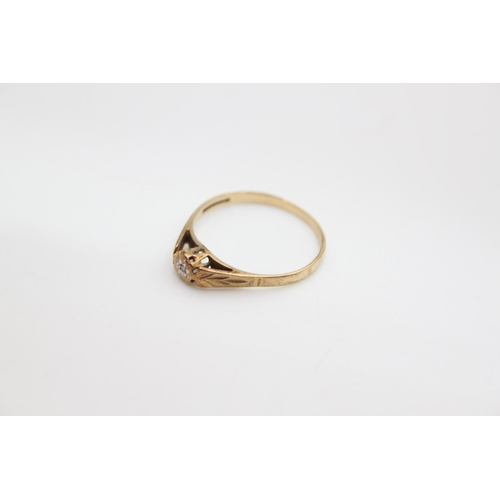 67 - A hallmarked Birmingham 9ct gold diamond soltiaire ring, size Q ½ - approx. gross weight 1.5 grams