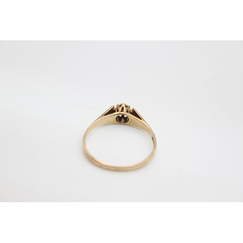 67 - A hallmarked Birmingham 9ct gold diamond soltiaire ring, size Q ½ - approx. gross weight 1.5 grams