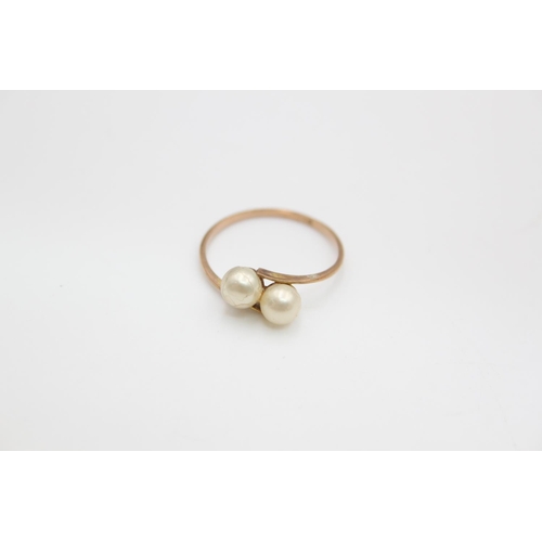 68 - A 9ct gold double pearl ring, size P ½ - approx. gross weight 1.3 grams