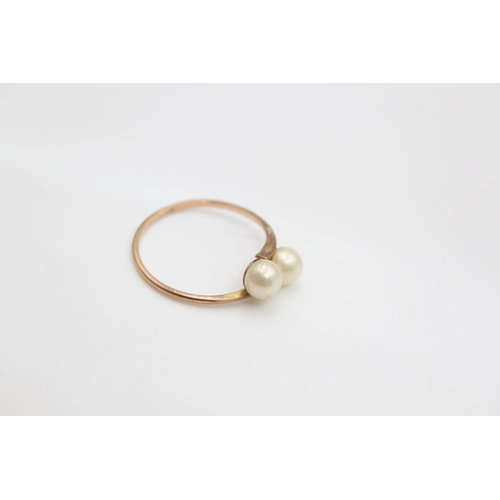 68 - A 9ct gold double pearl ring, size P ½ - approx. gross weight 1.3 grams