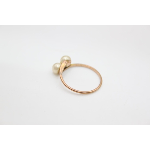 68 - A 9ct gold double pearl ring, size P ½ - approx. gross weight 1.3 grams