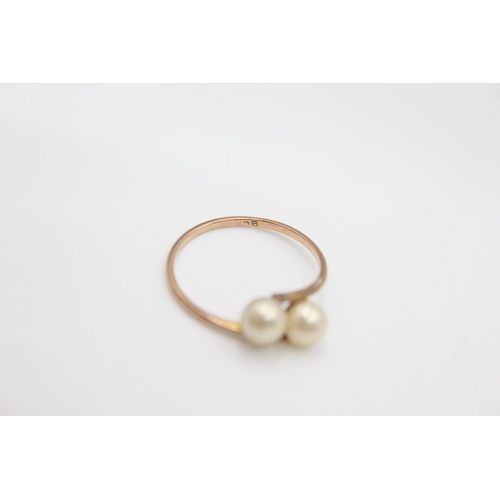 68 - A 9ct gold double pearl ring, size P ½ - approx. gross weight 1.3 grams