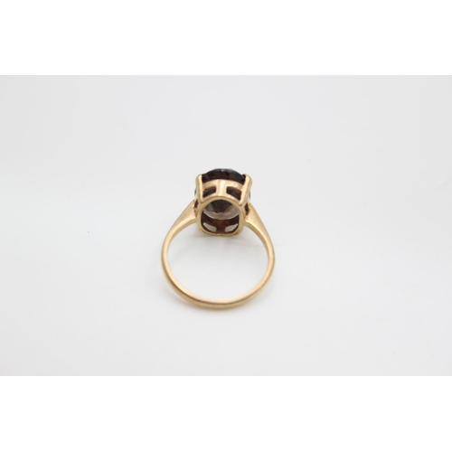 69 - A hallmarked Edinburgh 9ct gold smoky quartz set cocktail ring, size N ½ - approx. gross weight 3.3 ... 