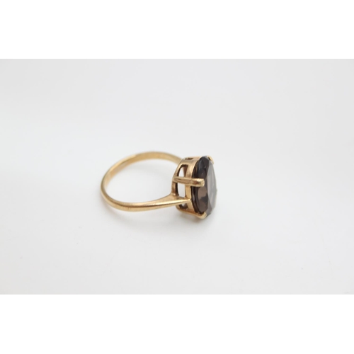 69 - A hallmarked Edinburgh 9ct gold smoky quartz set cocktail ring, size N ½ - approx. gross weight 3.3 ... 