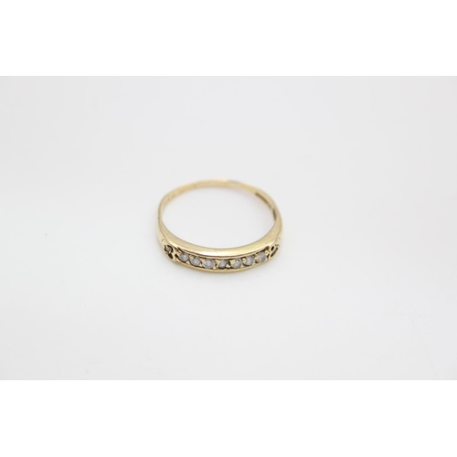 80 - A 9ct gold diamond set half eternity ring, size P - approx gross weight 1.6 grams