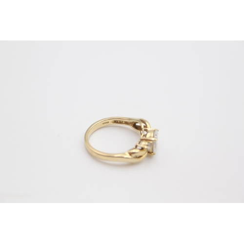 83 - A 14ct yellow gold CZ set cocktail ring, size M ½ - approx. gross weight 3.8 grams