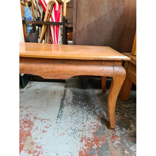 1105 - An Oriental style elm rectangular coffee table - approx. 45cm high x 127cm wide x 46cm deep