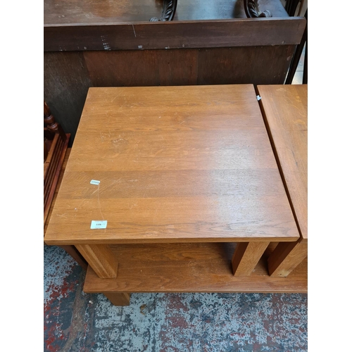 1106 - A modern oak rectangular coffee table with one drawer and two matching side tables