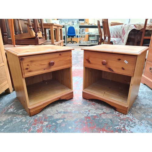 1110 - A pair of modern pine bedside cabinets with one drawer - approx. 51cm high x 46.5cm wide x 44cm deep