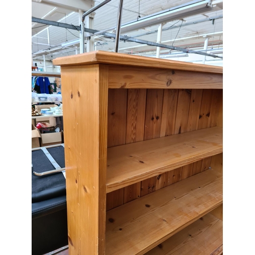 1116 - A modern pine bookcase - approx. 92cm high x 92cm wide x 24cm deep