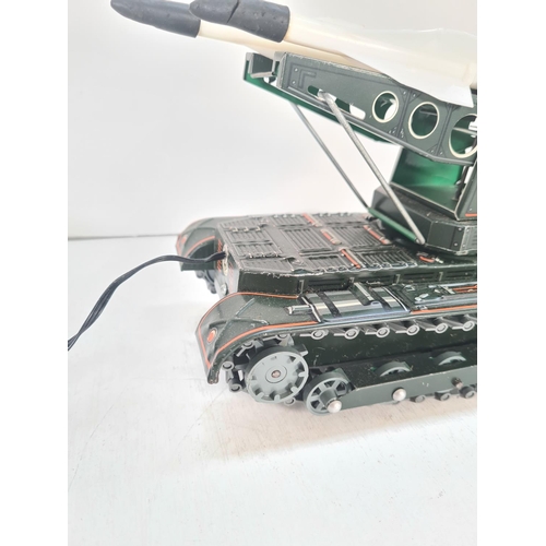 A boxed Japanese Modern Toys battery operated MS-58 remote