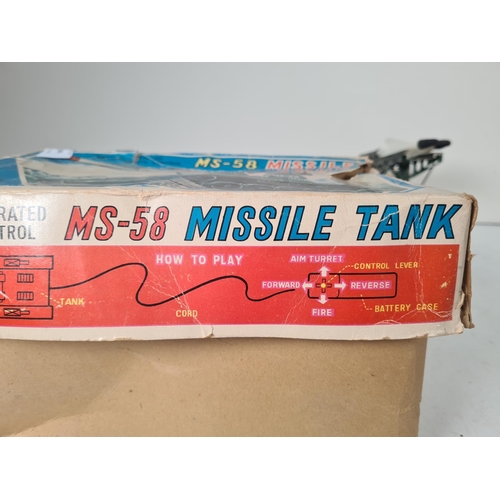 A boxed Japanese Modern Toys battery operated MS-58 remote control