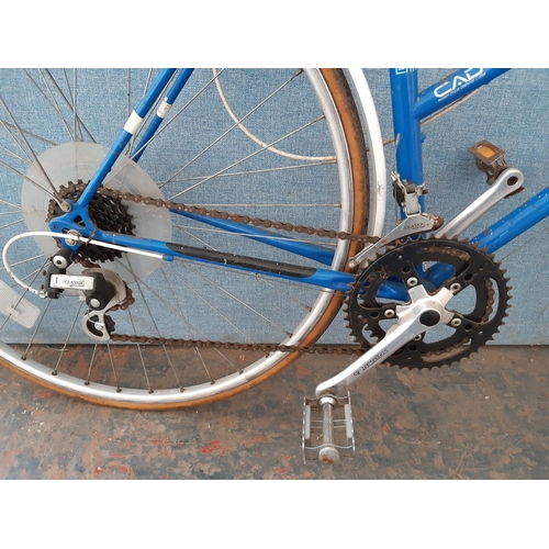 1247 - A vintage blue Peugeot lady's road bike with quick release front wheel and 12 speed Arris gear syste... 