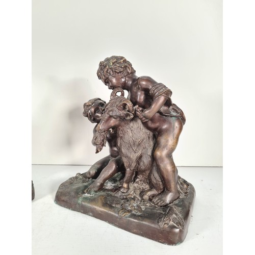 458 - A pair of mid 20th century French school bronze sculptures with bacchic putti fawning over sacrifici... 