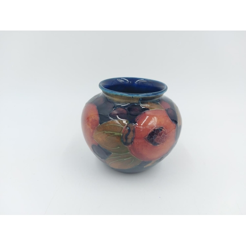 469 - A Moorcroft Pottery vase in the Pomegranate design - approx. 7cm high