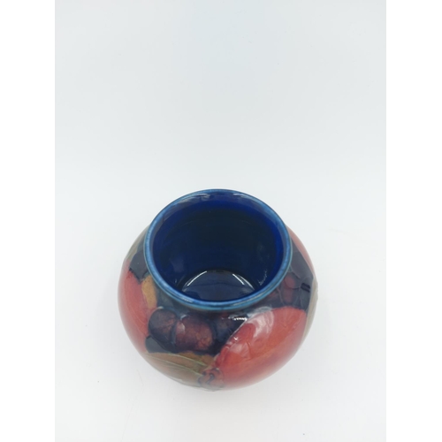 469 - A Moorcroft Pottery vase in the Pomegranate design - approx. 7cm high