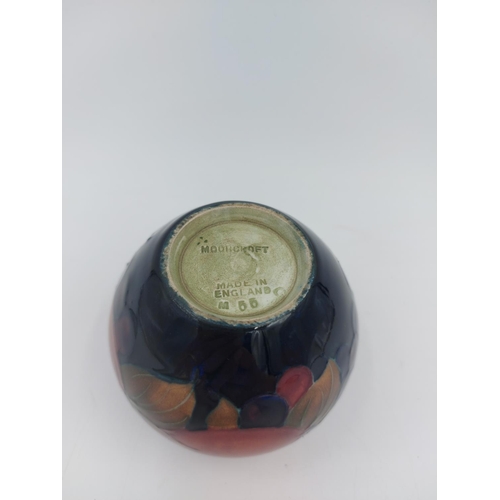 469 - A Moorcroft Pottery vase in the Pomegranate design - approx. 7cm high