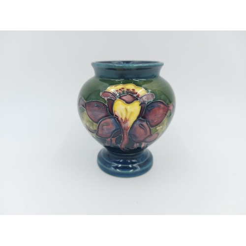 470 - A Moorcroft Pottery vase in the Columbine design - approx. 9cm high