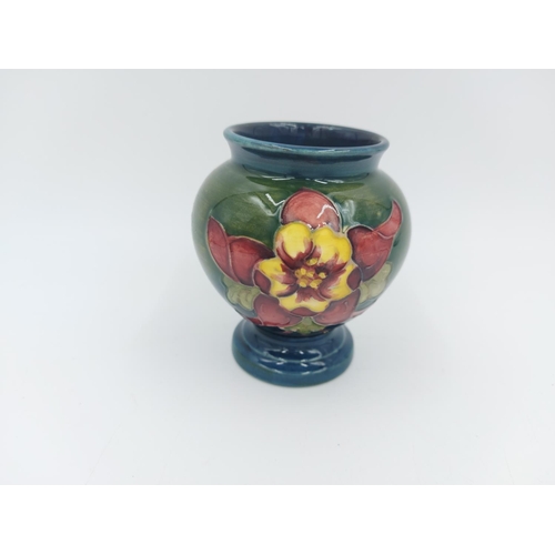 470 - A Moorcroft Pottery vase in the Columbine design - approx. 9cm high