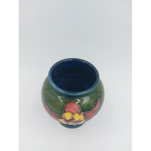 470 - A Moorcroft Pottery vase in the Columbine design - approx. 9cm high