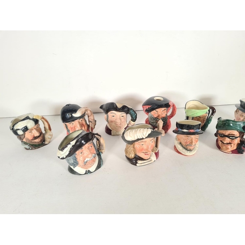 486 - Ten miniature character jugs, one Beswick Mr Pickwick and Nine Royal Doulton to include Beefeater, F... 