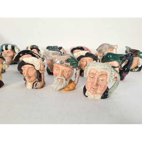 487 - Nineteen character jugs, one ceramic Henry VIII musical character jug and Eighteen Royal Doulton min... 