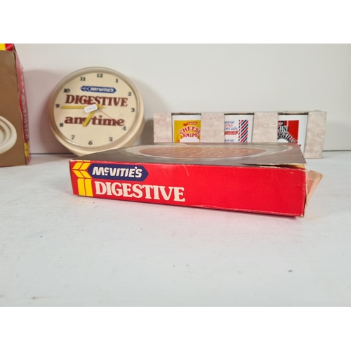 496 - A collection of McVities digestive advertising merchandise to include boxed set of four T. G. Green ... 