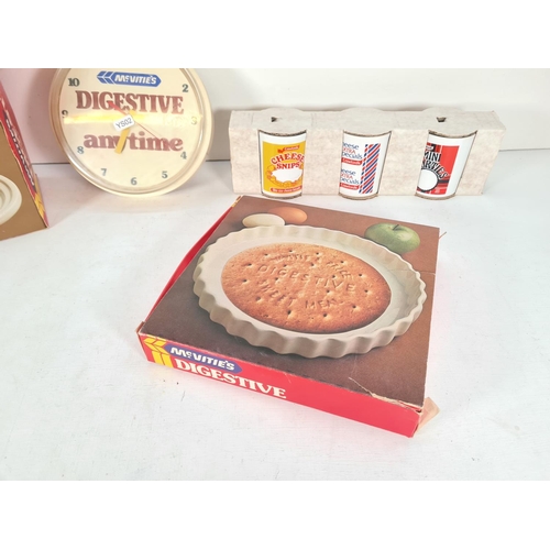 496 - A collection of McVities digestive advertising merchandise to include boxed set of four T. G. Green ... 