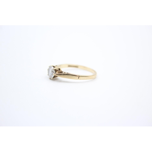 104 - A 9ct gold CZ solitaire ring - approx. gross weight 1.8 grams