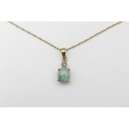 111 - A 9ct gold jade and diamond pendant necklace - approx. gross weight 1.8 grams