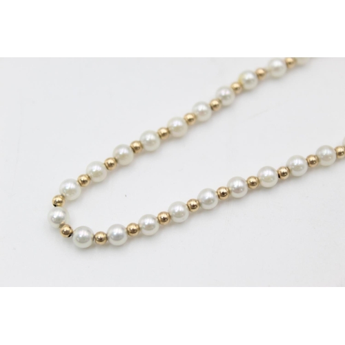 113 - A 9ct gold pearl bead bracelet - approx. gross weight 3 grams