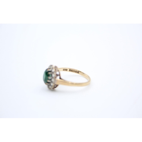 118 - A 9ct gold cluster ring with composite central stone - approx. gross weight 2.1 grams