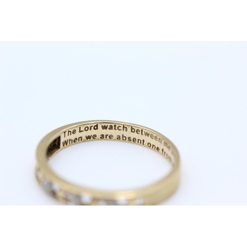 133 - A 9ct gold diamond band ring with inscribed quote - approx. gross weight 1.5 grams