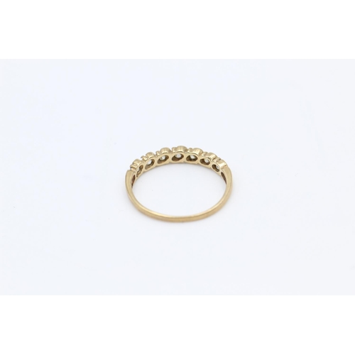 135 - A 9ct gold half eternity gemstone ring - approx. gross weight 1.6 grams