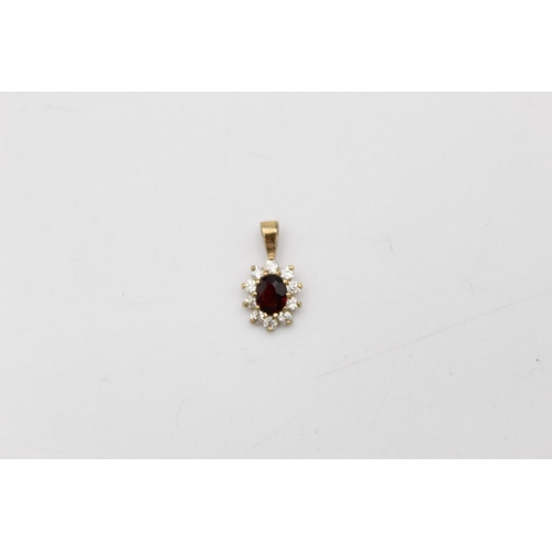 150 - Two pieces of 9ct gold garnet and gemstone set jewellery to include a pair of earrings and matching ... 