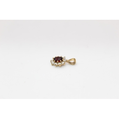 150 - Two pieces of 9ct gold garnet and gemstone set jewellery to include a pair of earrings and matching ... 