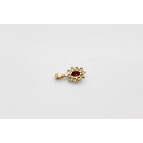 150 - Two pieces of 9ct gold garnet and gemstone set jewellery to include a pair of earrings and matching ... 