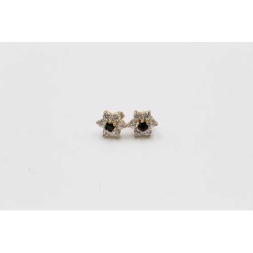 150 - Two pieces of 9ct gold garnet and gemstone set jewellery to include a pair of earrings and matching ... 