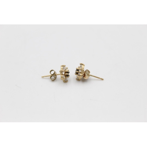 150 - Two pieces of 9ct gold garnet and gemstone set jewellery to include a pair of earrings and matching ... 