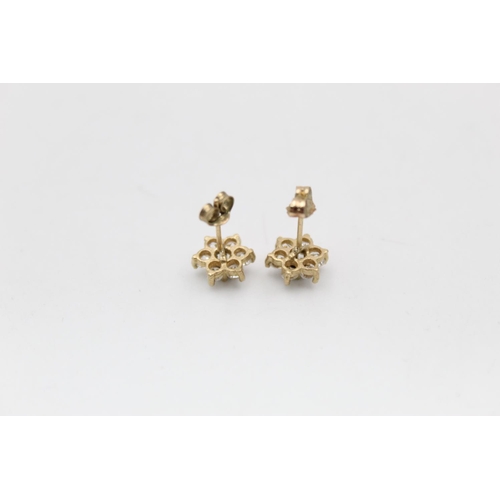 150 - Two pieces of 9ct gold garnet and gemstone set jewellery to include a pair of earrings and matching ... 