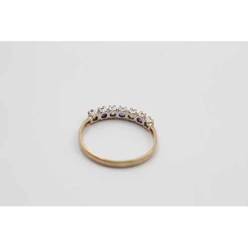 151 - A 9ct gold amethyst and gemstone set half eternity ring - approx. gross weight 1.3 grams