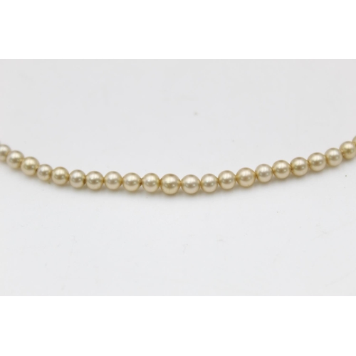 162 - A pearl necklace with 9ct gold clasp - approx. gross weight 5.8 grams