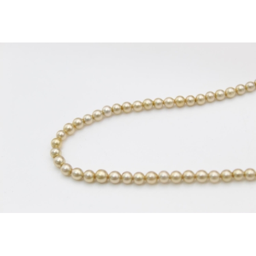 162 - A pearl necklace with 9ct gold clasp - approx. gross weight 5.8 grams