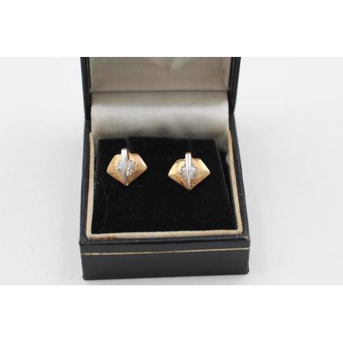 169 - A pair of 9ct gold bicolour geometric gemstone stud earrings - approx. gross weight 1.2 grams