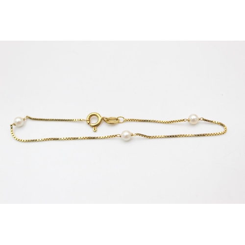 170 - A 9ct gold pearl bracelet - approx. gross weight 1.1 grams