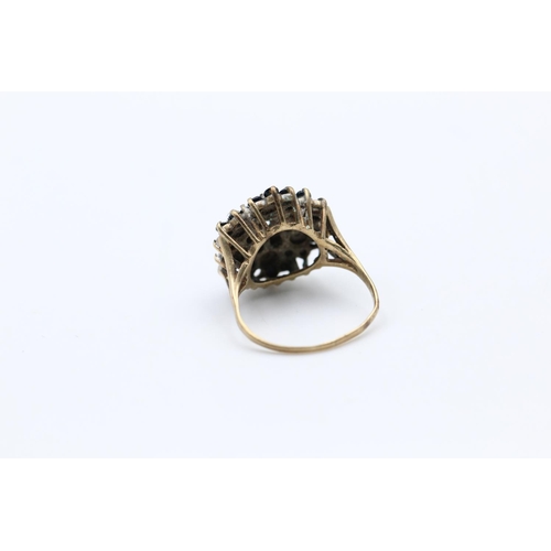 183 - A 9ct gold sapphire and diamond cluster ring - approx. gross weight 3.9 grams